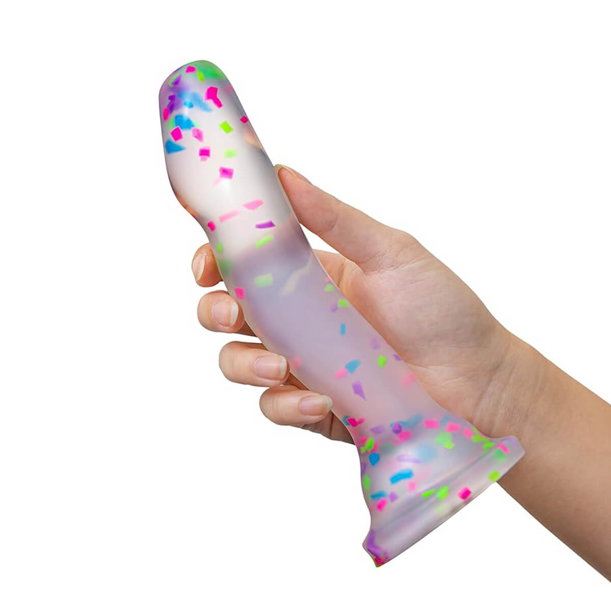 Hand holding clear silicone dildo with neon confetti Nudie Co