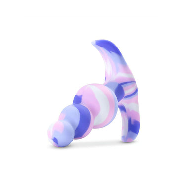Side view of a blue and pink marbled silicone butt plug Nudie Co