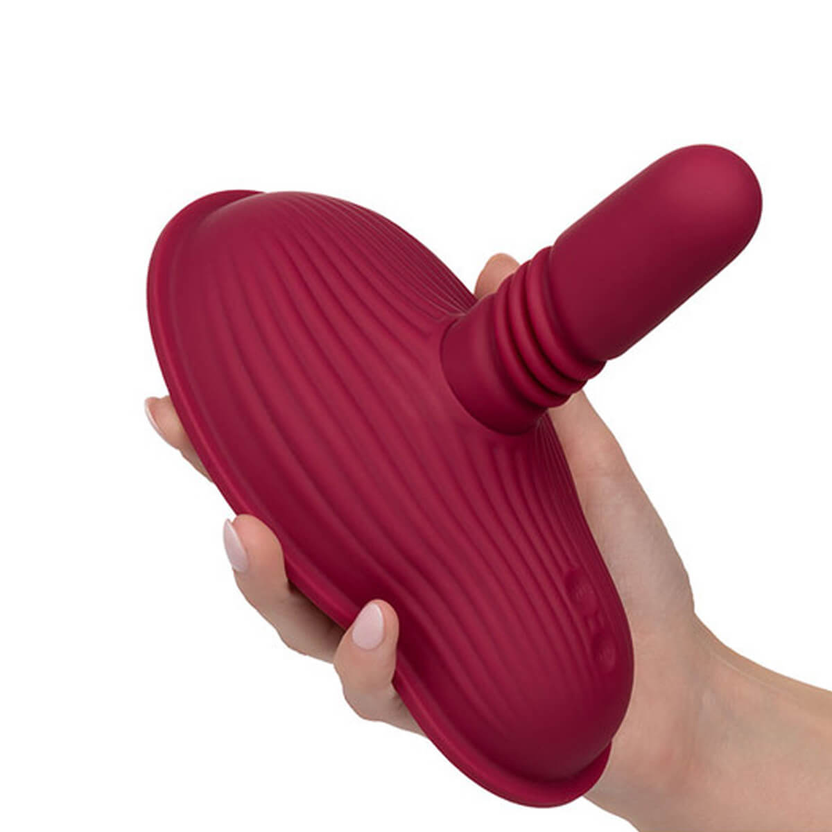 Hand holding a Red silicone grinding pad with shaft for internal stimulation Nudie Co