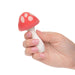 Hand holding a silicone mushroom-shaped compact vibrator Nudie Co