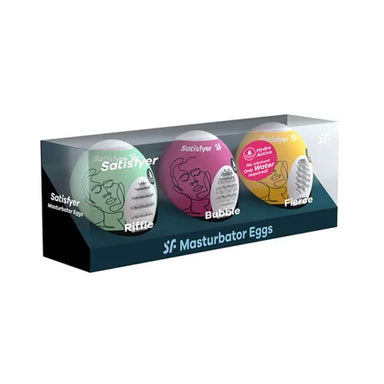 See-through rectangular box containing three masturbator eggs Nudie Co