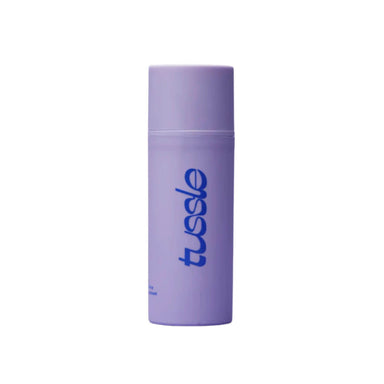 Purple bottle of personal lubricant with bright blue logo Nudie Co