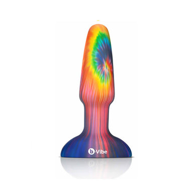 Tie-dye butt plug with b-vibe logo at the bottom on a white background Nudie Co