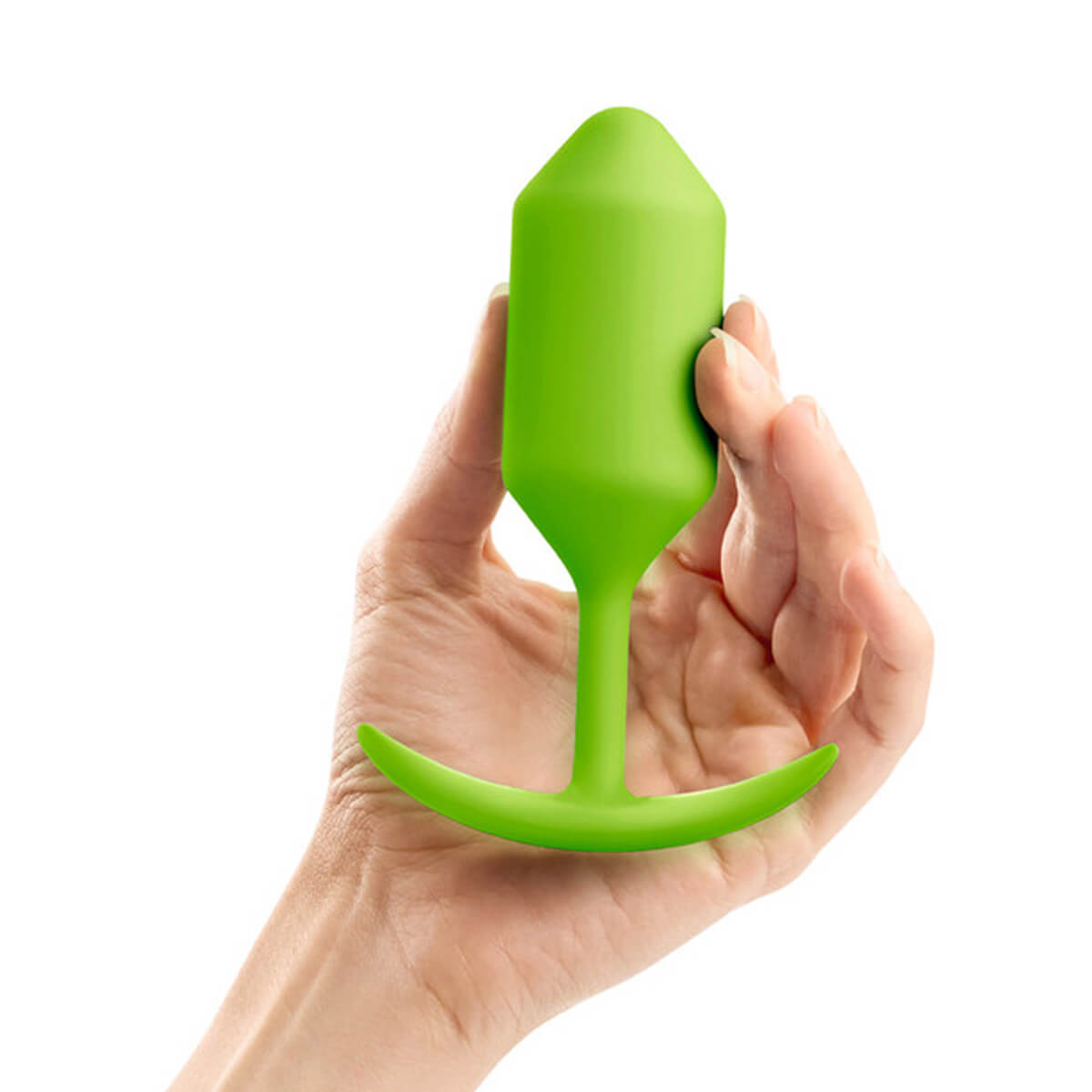 Hand holding a lime green silicone butt plug with torpedo shape Nudie Co