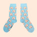 Blue cotton socks with penis pattern over a beige background Nudie Co
