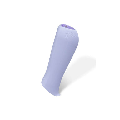 Upside-down lavender Dame Kip lipstick vibrator with flexible tip pressed against beige background Nudie Co