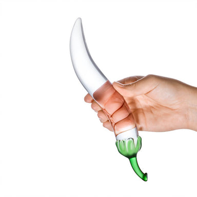 Hand holding a chilli-shaped glass dildo made out of glass Nudie Co