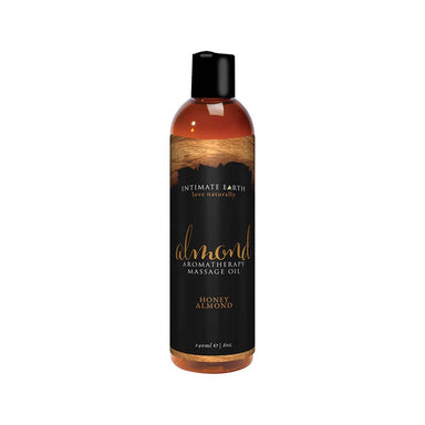 Brown bottle of organic and vegan Almond massage oil with black label Nudie Co