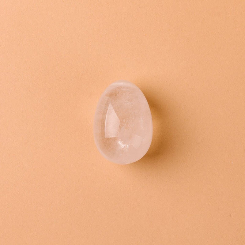 Medium yoni egg for kegel exercise made out of natural clear quartz crystal Nudie Co