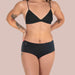Front view of woman wearing black bra and black shortie latex underwear Nudie Co