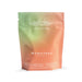 Green and orange packet of 60 vegan capsules of UTI supplement Nudie Co