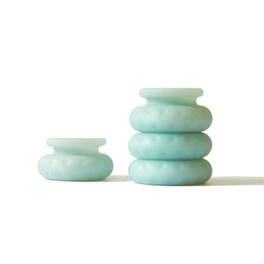 Set of stacked jade-coloured Ohnut rings for customisable penetration depth Nudie Co