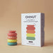 Set of stacked rainbow-coloured Ohnut rings for customisable penetration depth Nudie Co