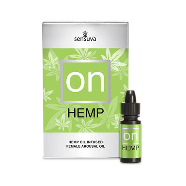 Green bottle of natural hemp arousal oil for her and its green packaging Nudie Co