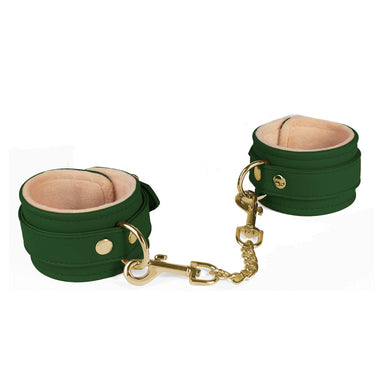 Green vegan leather wrist cuffs with gold details and plush lining Nudie Co