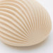 Details of the ribbed surface of Tenga Kushi clitoral vibrator Nudie Co