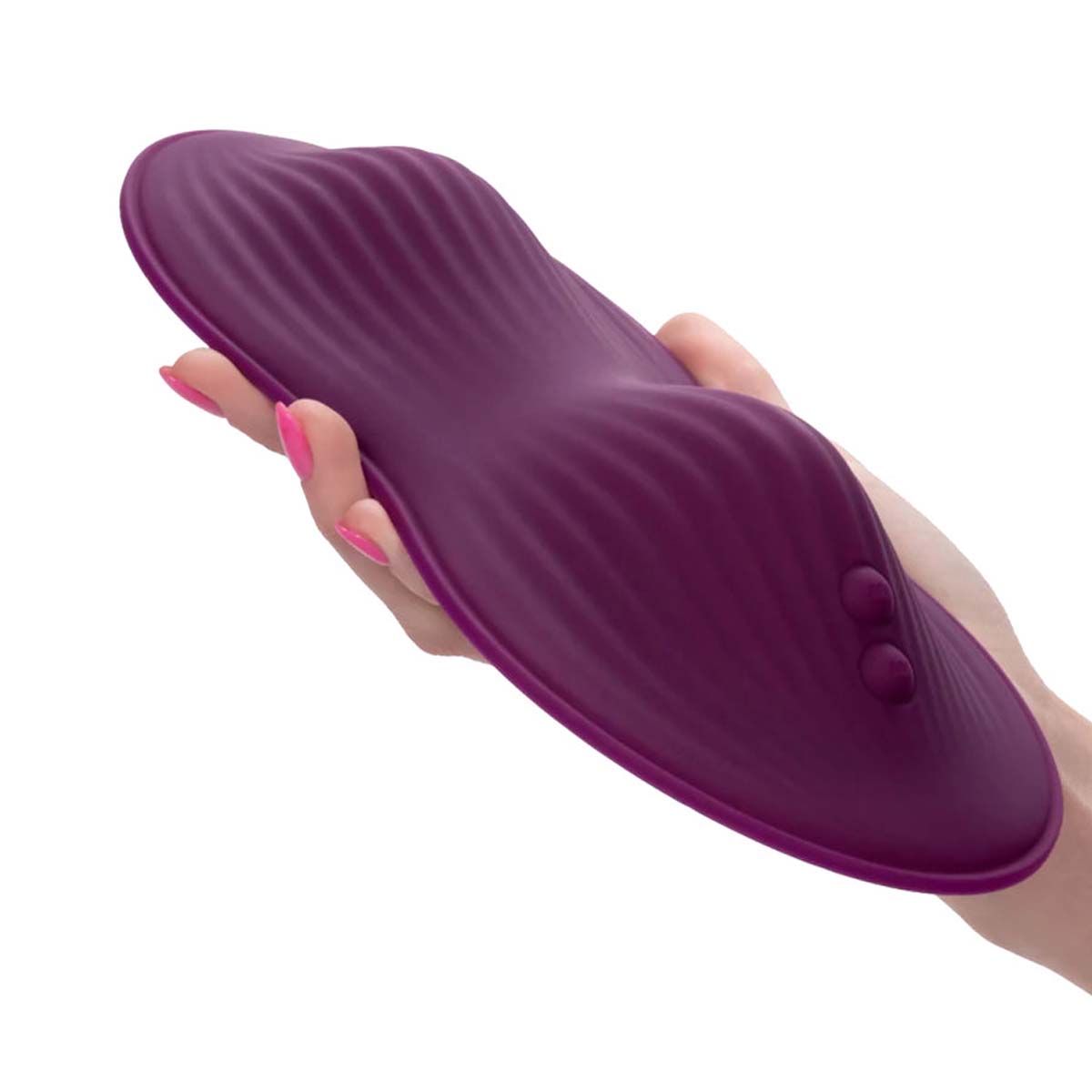 Hand holding a dark purple textured silicone vibrating pad with two control buttons Nudie Co